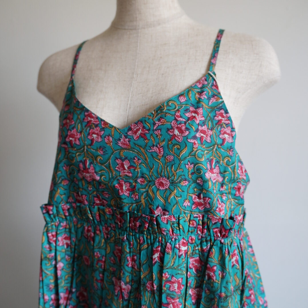 green camisole tiered dress